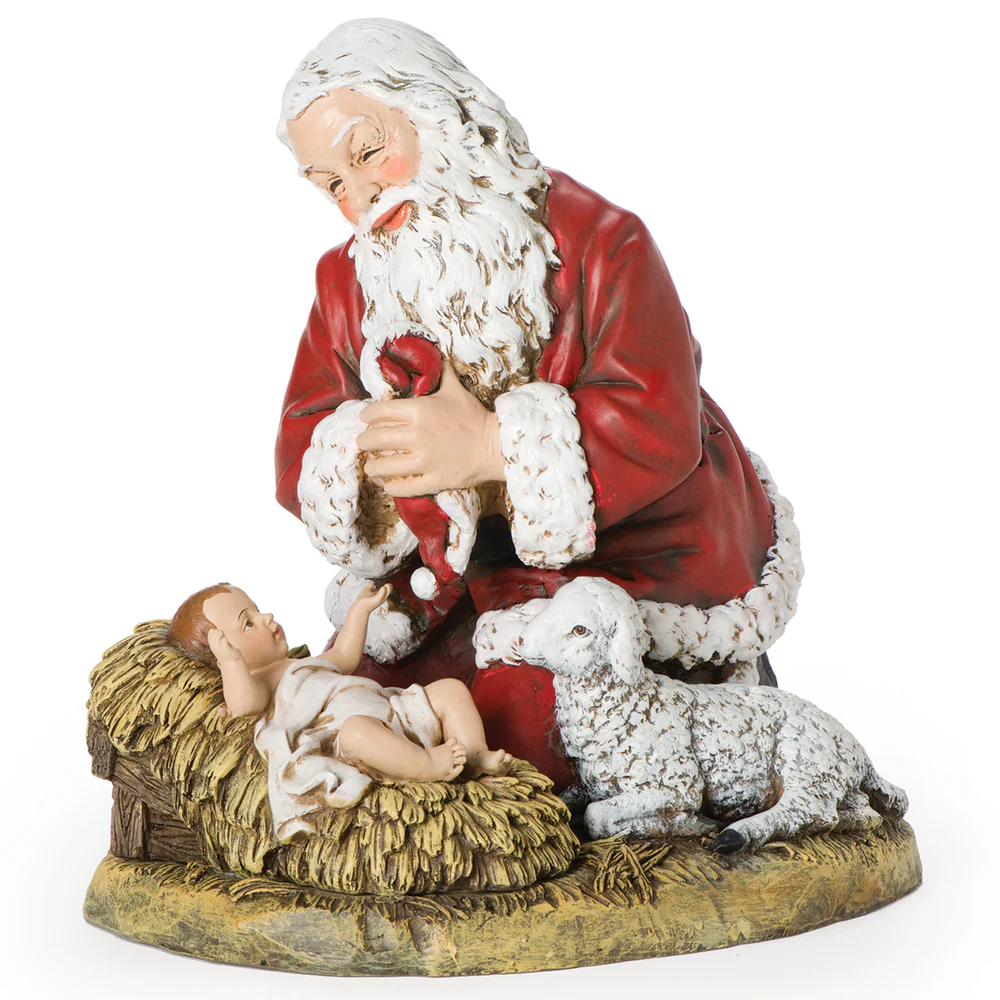 Santa Claus adorando al Niño Jesús 33 cm