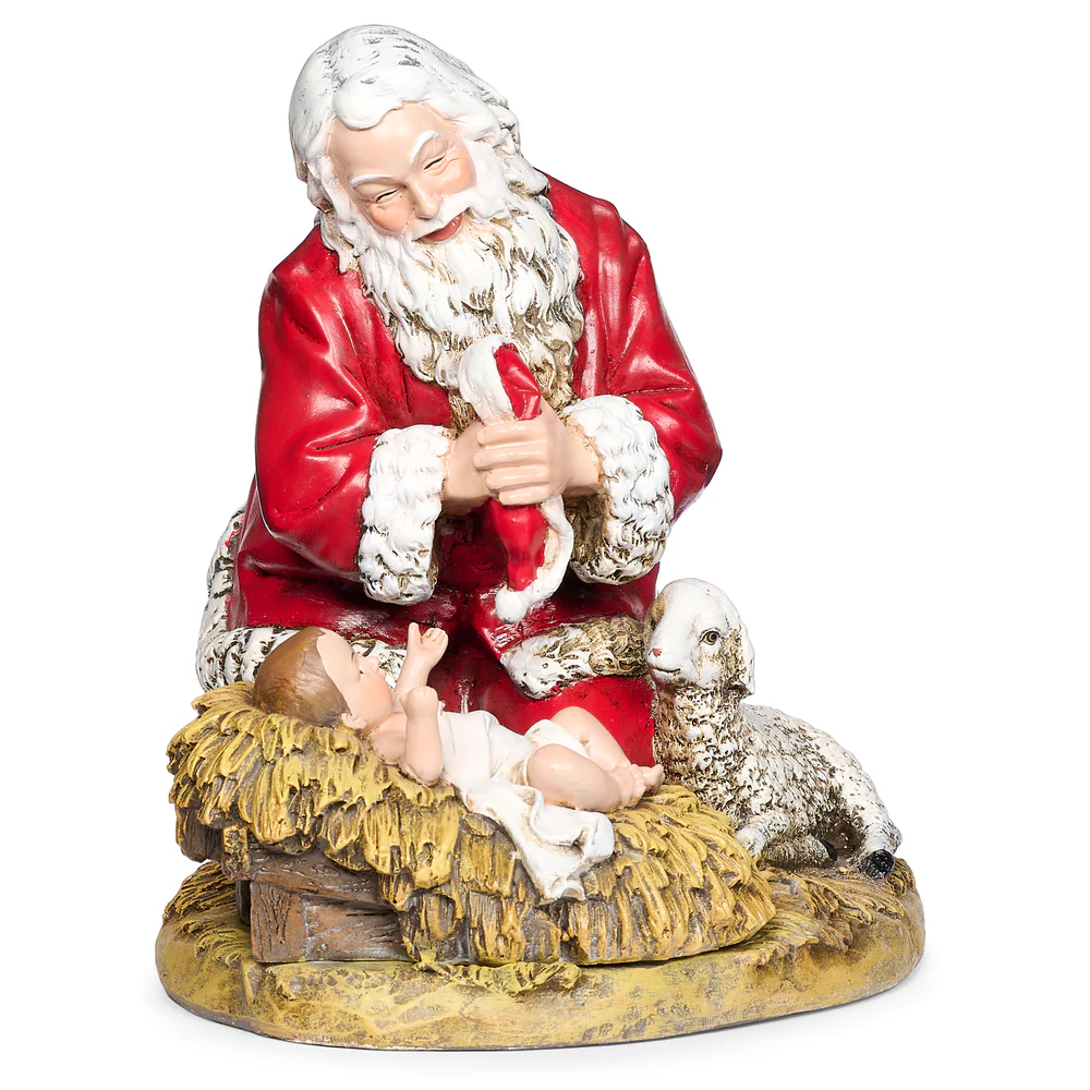 Santa Claus adorando al Niño Jesus 20 cm